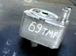 Теплообменник масляного фильтра к Audi, 2010 Audi A5 (S5,RS5) 1 038.117VWH